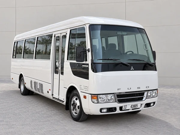 White Mitsubishi Fuso Rosa 26-seater bus