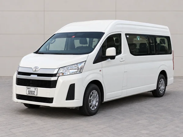 White Toyota Hiace 12-seater van